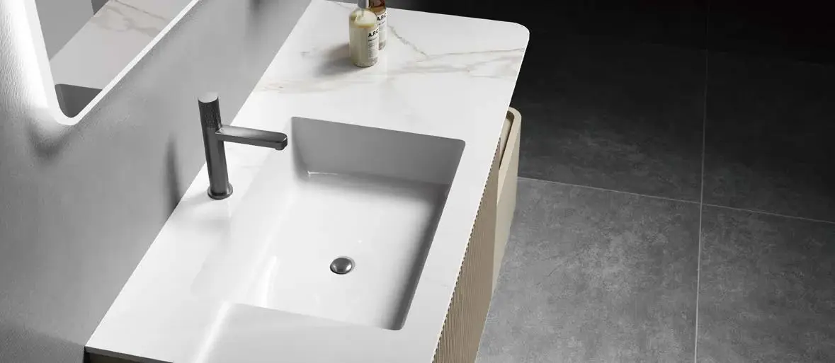 Material, lighting and suspended design: Seamless integrated basin