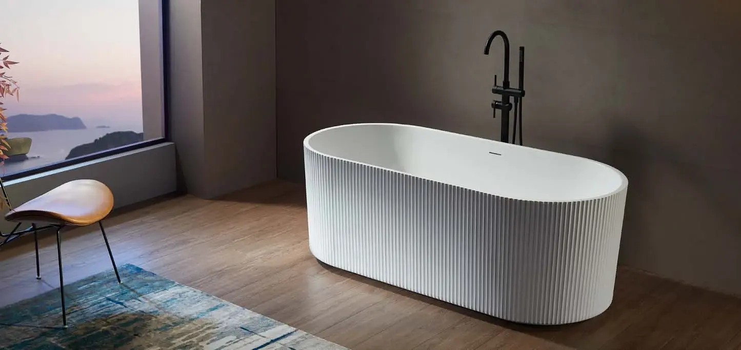 Sculptural soaking baths: Rounded soaking bath in room setting