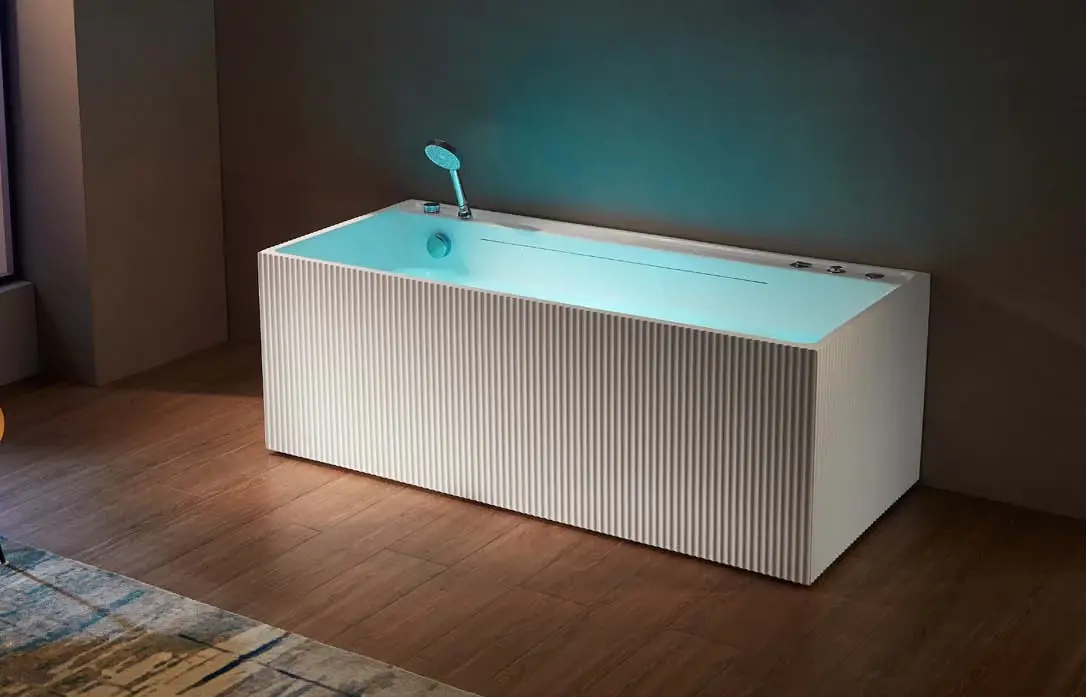 Deck-integrated massage baths: Integrated faucet and control deck